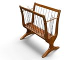 un porte-revues en bois muni d'un compartiment à magazines