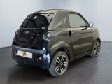 an image of a smart car parked in a showroom