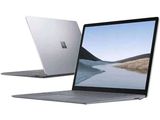 two laptops side by side on a white background with a lake in the background