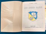 an open book with a picture of a soccer team on it