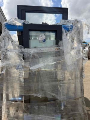 a large pile of plastic wrapped up on a pallet