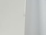 a toothbrush sitting on the edge of a bathroom sink