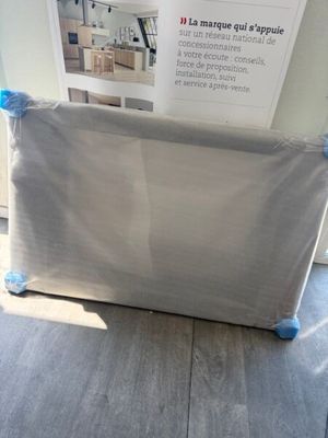 a baby crib that is on the floor in the room