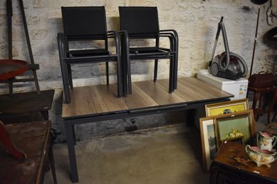 two chairs that are sitting on a table in a room