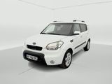 the white car is parked in a white room with a white floor