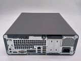 a black and silver computer on a white surface