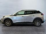 a silver suv parked in a room with a gray floor