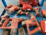 many tools that are sitting on a blue table