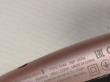 a close up of a hair dryer on a table