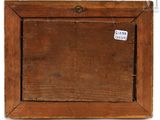 an old wooden picture frame with a sticker on it