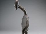 an image of a sculpture of a person with a helmet on