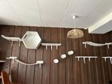 a room with a wooden wall and a chair in it