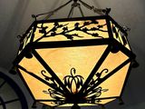 a light that is hanging from the ceiling in a room