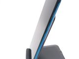 a cell phone that is sitting on a stand