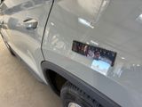 a close up of a car with a sticker on it