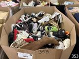 many boxes of shoes that are sitting in a room