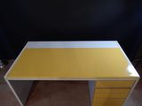 yellow and white desk with drawers