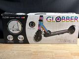 a box that has a colorful scooter inside of it