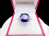 an image of a blue diamond ring in a red box