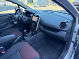 the interior of a car with a dashboard and steering controls