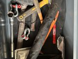 a metal box with tools in it and a wrench in it