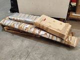 a pile of boxes sitting on a pallet in a warehouse