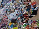 a table covered with many different types of cards on it