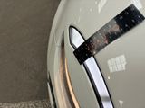 a close up of a sticker on a car ' s hood