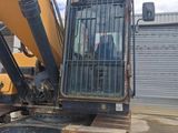an image of a backhoe of a construction vehicle