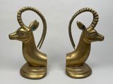 paire de serre-livres en laiton représentant des antilopes, sur des socles en marbre
