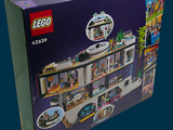 a box with a lego city set inside of it