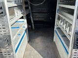 an image of the inside of a truck with shelves