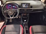 a picture of a car dashboard with a steering wheel and dashboard lights
