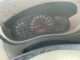 a close up of a car dashboard with a speedometer