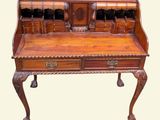an image of a wooden desk with drawers and drawers on it