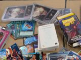 a lot of cards and dvds on the table