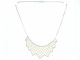 a picture of a necklace that is hanging on the wall