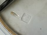 a white plate with a blue and white design on it
