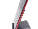 a cell phone that is sitting on a stand