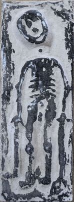 a picture of a picture of a skeleton on the wall