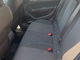 the back seats of a car with a seat belt in a car