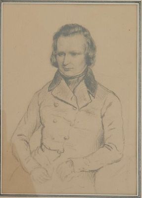 portrait of a man in a military uniform with his hands in his pockets
