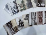 many old photos of people on a white table
