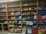 a room with a lot of boxes and boxes on the shelves
