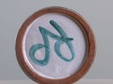 a picture of a close up of a number on a plate