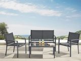the patio furniture is set up on a patio with a view of the ocean
