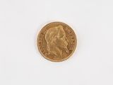 an image of a gold coin on a white surface