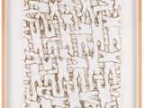 une image représentant un tableau aux motifs marron et blancs