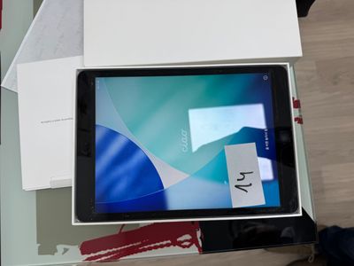 a tablet that is sitting in a box on a table