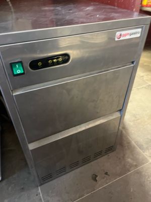 a stainless steel dishwasher sitting on the floor